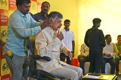 Telugu Desam Party leader N Chandrababu Naidu prepares to address a press conference near Amaravati, in the southern state of Andhra Pradesh, after the results of India's general election were released. AP