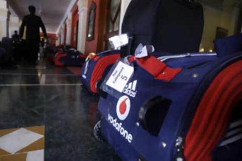 The baggage of the England cricket team lies in the lobby of a hotel in Bhubaneswar. The BCCI vice president Lalit Modi says the two-Test series between India and England will go ahead, although England cricket officials have yet to confirm this.
