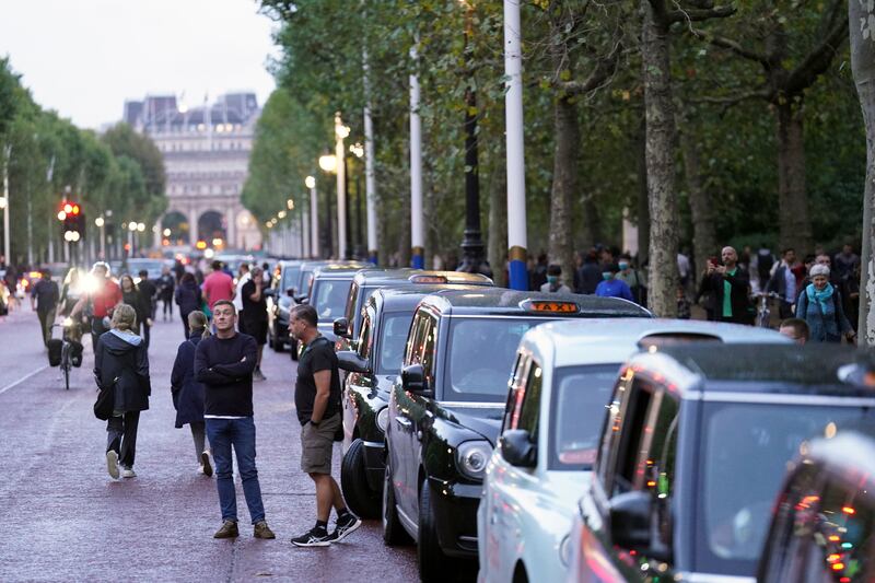 Taxis lined up along The Mall leading to Buckingham Palace in London after the announcement of the death of Queen Elizabeth. PA
