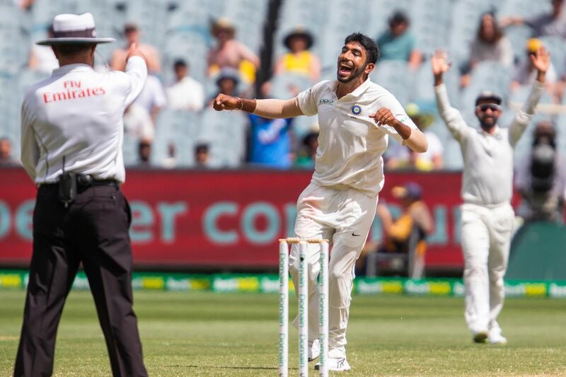 India's Jasprit Bumrah, centre, celebrates after getting a wicket during play on day three of the third cricket test between India and Australia in Melbourne, Australia. AP Photo