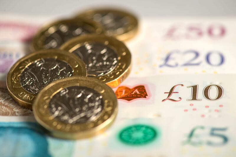 British wages rose while unemployment dropped by a small margin in the three months to April 2023. PA