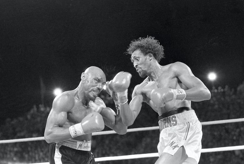 Challenger Thomas "Hit Man" Hearns strikes middleweight champion "Marvelous" Marvin Hagler with a right to the face during a boxing match in Las Vegas, Nevada. April 15, 1985.