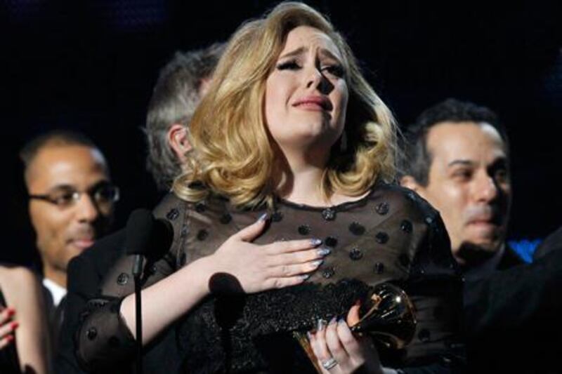 Adele accepts Album of the Year for "21" at the 54th annual Grammy Awards. Mario Anzuoni / Reuters
