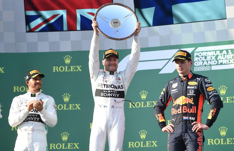 Mercedes' Valtteri Bottas holds the winners trophy after winning the Formula One F1 Australian Grand Prix at the Albert Park Grand Prix Circuit in Melbourne, Australia.  REUTERS