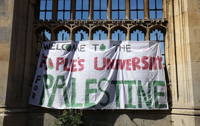 A banner at King's College shows the students' determination to support Palestinians under siege in Gaza. EPA
