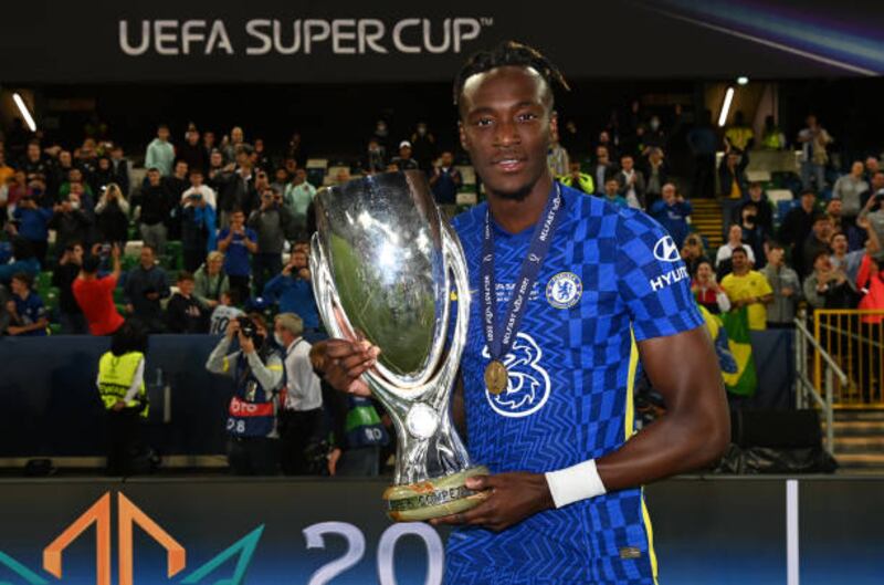 Tammy Abraham of Chelsea holds the Uefa Super Cup.