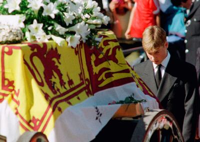 Prince William walks with his head bowed behind the coffin of his mother Princess Diana on its way to London's Westminster Abbey for her funeral ceremony in 1997. AP Photo