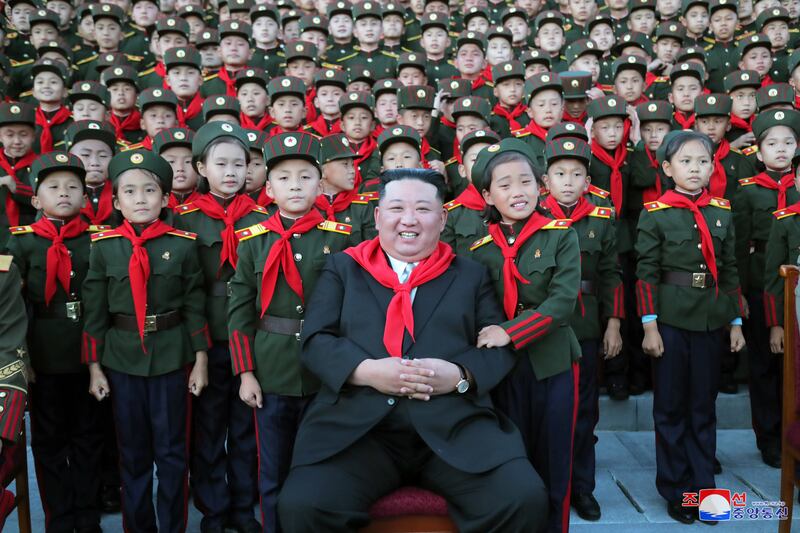 North Korean leader Kim Jong-un with pupils while attending a ceremony to mark the 75th anniversary of the Mangyongdae Revolutionary School and Kang Pan Sok Revolutionary School in Pyongyang, North Korea. EPA