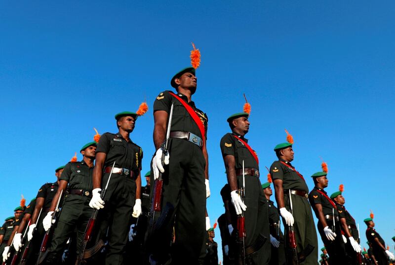 Army soldiers march in a military parade at a rehearsal for Sri Lanka's 71st Independence day celebrations in Colombo, Sri Lanka. Reuters