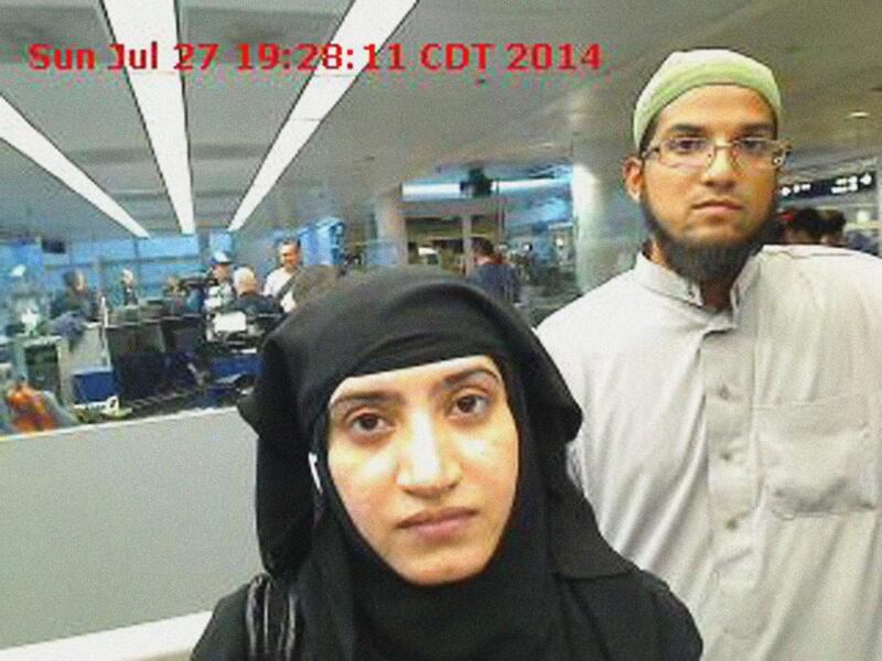 Syed Farook, who killed 14 people at a party organised by his employer in San Bernardino, and his wife Tashfeen Malik are captured on CCTV as they pass through Chicago’s O’Hare airport in 2014. US Customs and Border Protection / AFP Photo