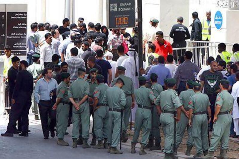 People queuing outside the Emaar sales office yesterday in Dubai. Some were there for hours. Satish Kumar / The National