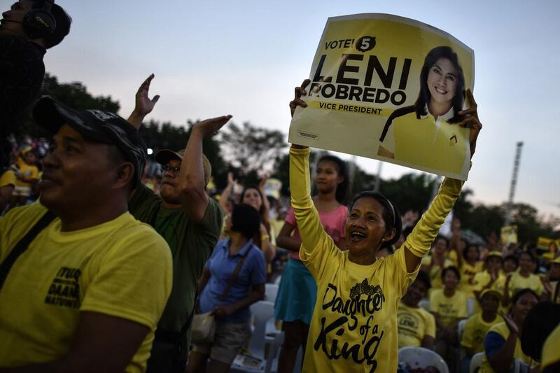 A Leni Robredo supporter. AFP PHOTO / MOHD RASFAN