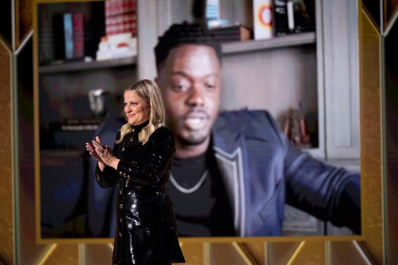 Host Amy Poehler during the 78th annual Golden Globe Awards ceremony at the Beverly Hilton Hotel as Daniel Kaluuya accepts his award. EPA / HFPA