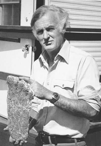 Peter Byrne holds a plaster cast of what may be a Bigfoot footprint at his information center at The Dalles, Ore. on Oct 30, 1975. The Dalles is central to most sightings of the Pacific Northwest's legendary creature. Reports of the ape-like Bigfoot, or Sasquatch, are again coming in from the area's rugged wilds and Byrne has spent over four years full time keeping track of them. (AP Photo)
