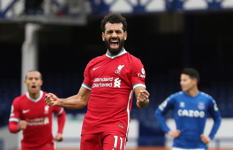 Liverpool's Mohamed Salah celebrates scoring his side's second goal during the Premier League soccer match between against Everton. AP