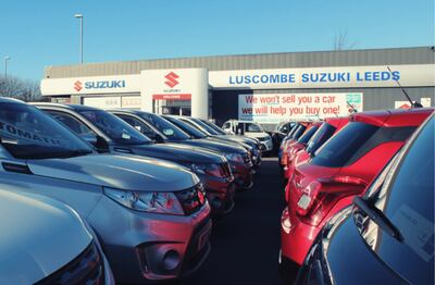 A Luscombe Motors forecourt where proprietor and employees alike are thrilled at having fewer cars to sell. Photo: Luscombe Motors