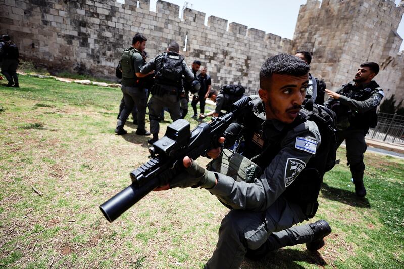 Armed border policeman look to quell the violence. Reuters