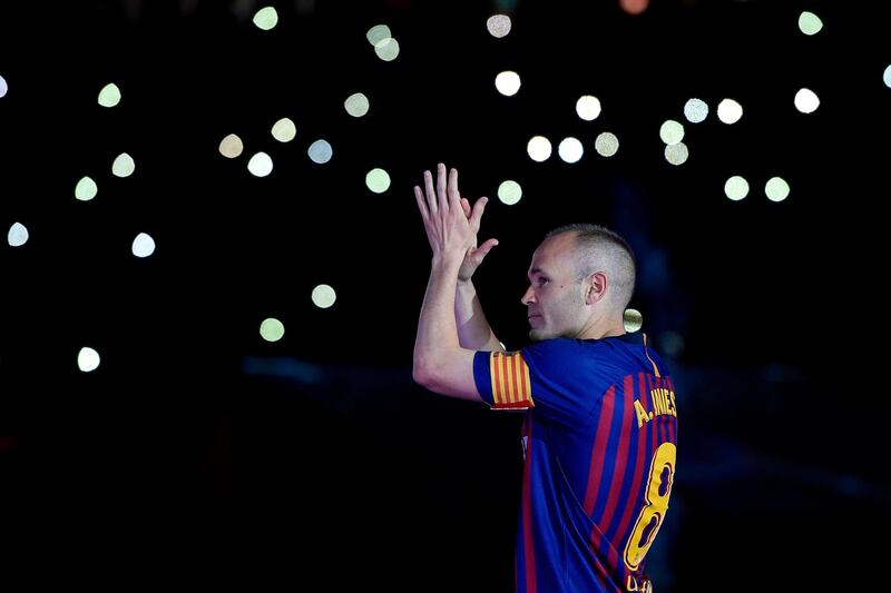 Barcelona's Andres Iniesta acknowledges the fans. Lluis Gene / AFP
