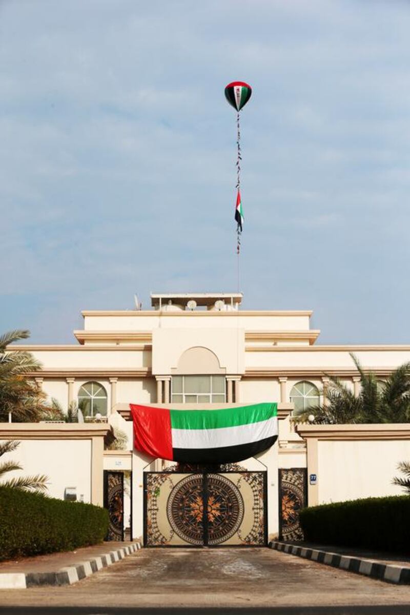 National Day decorations adorne a Khalifa City villa in Abu Dhabi. Christopher Pike for The National