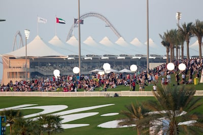 A handout photo of fans watch the races from Abu Dhabi Hill and the Main Grandstand Formula 1 Etihad Airways Abu Dhabi Grand Prix. Yas Marina Circuit, 28th November 2015. United Arab Emirates. (Courtesy: Yas Marina Circuit) *** Local Caption ***  al24no-f1-abudhabihill.jpg