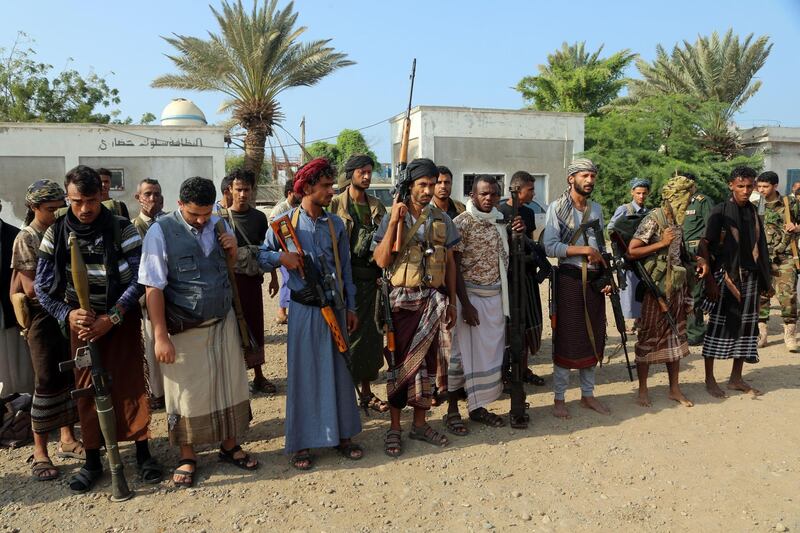 Houthi rebels gather in the port city of Hodeidah. AFP
