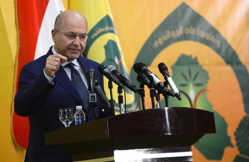 Iraqi President Barham Salih delivers a speech during a ceremony to mark the 37th anniversary of the establishment of the Supreme Islamic Iraqi Council in Baghdad. EPA