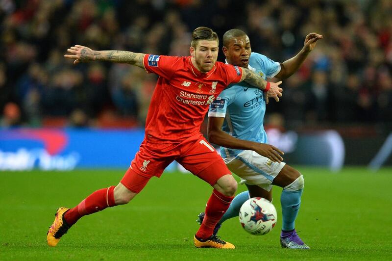 Liverpool’s Spanish defender Alberto Moreno (L) vies with Manchester City’s Brazilian midfielder Fernando (R) during the English League Cup final football match between Liverpool and Manchester City at Wembley Stadium in London on February 28, 2016. AFP / GLYN KIRK