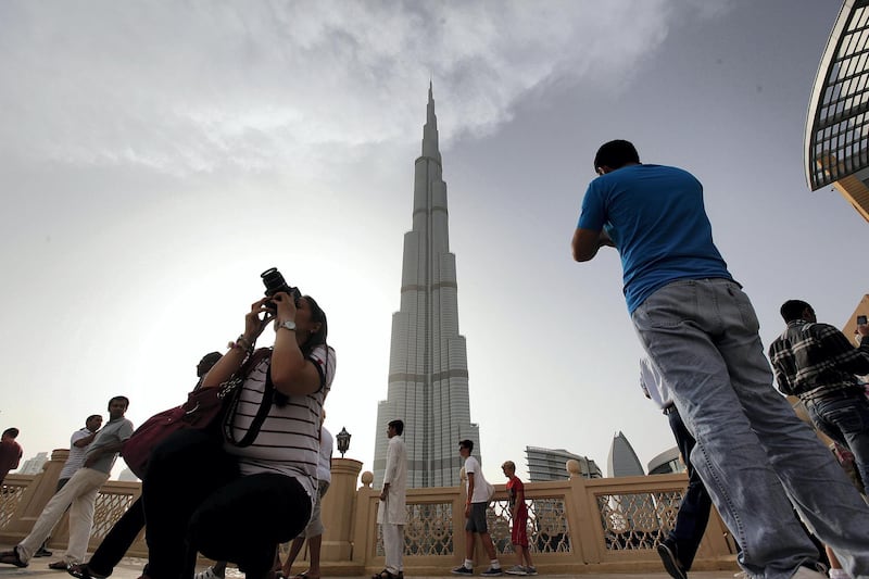 Dubai, United Arab Emirates- August, 10, 2013: Visitors at the Burj Khalifa during the EID holidays in Dubai . ( Satish Kumar / The National ) For News *** Local Caption ***  SK100-BurjKhalifa-01.jpg