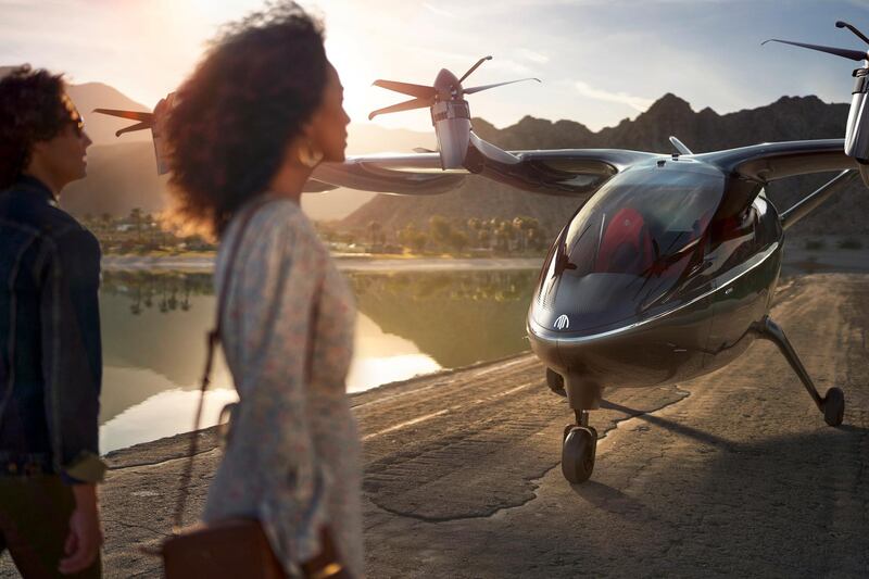 This photo provided by Archer shows the company's eVTOL aircraft. On Wednesday, Feb. 10, 2021, United Airlines announced it will buy up to 200 small electric air taxis to help customers in urban areas get to the airport. The airline said it will help electric-aircraft startup Archer develop an aircraft capable of helicopter-style, vertical takeoffs and landings. Archer hopes to deliver its first aircraft in 2024, if it wins certification from the Federal Aviation Administration. (Jeff Ludes/Archer via AP)