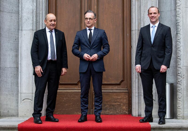 BERLIN, GERMANY - JUNE 19:  Germany Foreign Minister Heiko Maas (C) welcomes British Foreign Secretary Dominic Raab (R) and French Foreign Minister Jean-Yves Le Drian (L) to a meeting in the so-called E3 format at Villa Borsig on June 19, 2020 in Berlin, Germany. According to the German Foreign Ministry, the meeting served to exchange information on current bilateral, European and other international issues. (Photo by Bernd von Jutrczenka-Pool/Getty Images)