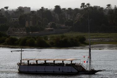 A cruise boat sails along the Nile River in Luxor, Egypt. The private sector in Egypt is optimistic about the rebound in business activity in the months ahead. Reuters.