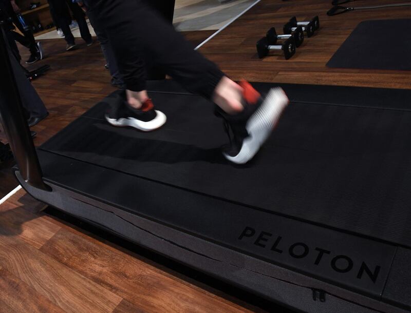 (FILES) In this file photo taken on January 10, 2018 a detail shot shows the running deck of a Peloton Tread treadmill during CES 2018 at the Las Vegas Convention Center  in Las Vegas, Nevada.  Exercise equipment maker Peloton on May 5, 2021 announced it had agreed with US safety regulators to recall some of its treadmills after multiple accidents, including one that killed a child, and apologized for not acting sooner. / AFP / GETTY IMAGES NORTH AMERICA / Ethan Miller
