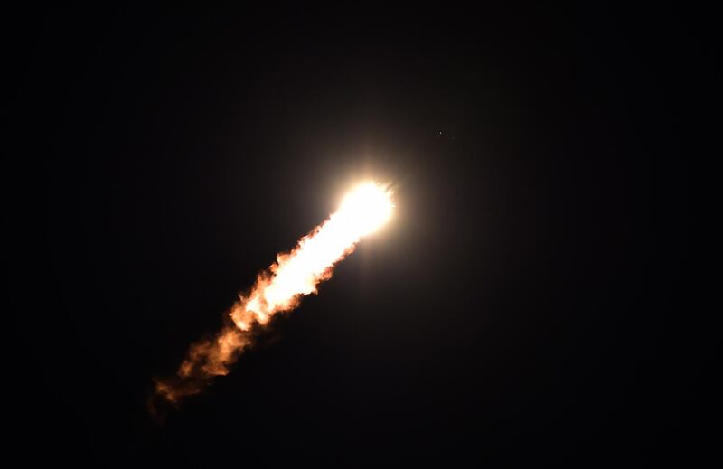 The Soyuz MS-15 rocket carrying three crew members of the International Space Station (ISS) flies moments after blasting off. AFP