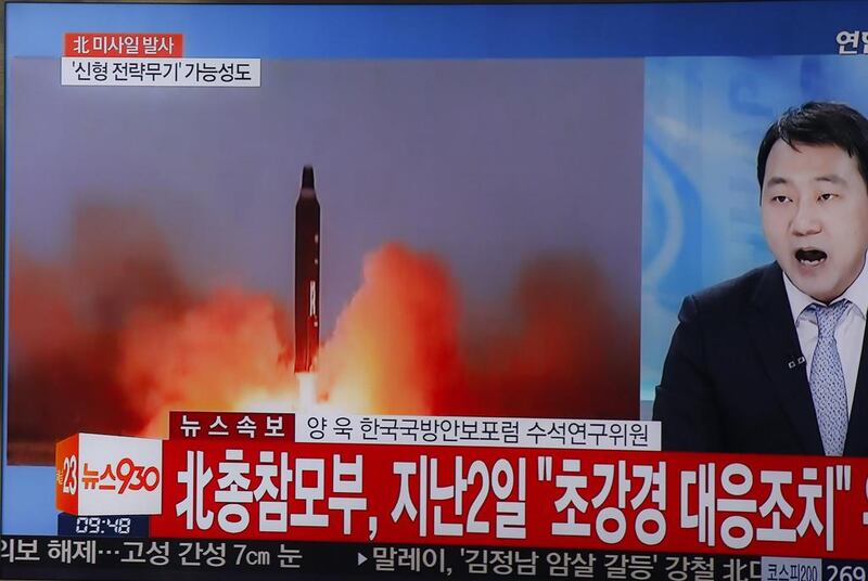 A television displays a news broadcast reporting on North Korea test-firing ballistic missiles, at a station in Seoul, South Korea. EPA