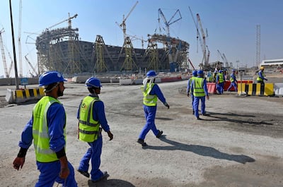 Construction workers at Doha's Lusail Stadium in 2019. AFP