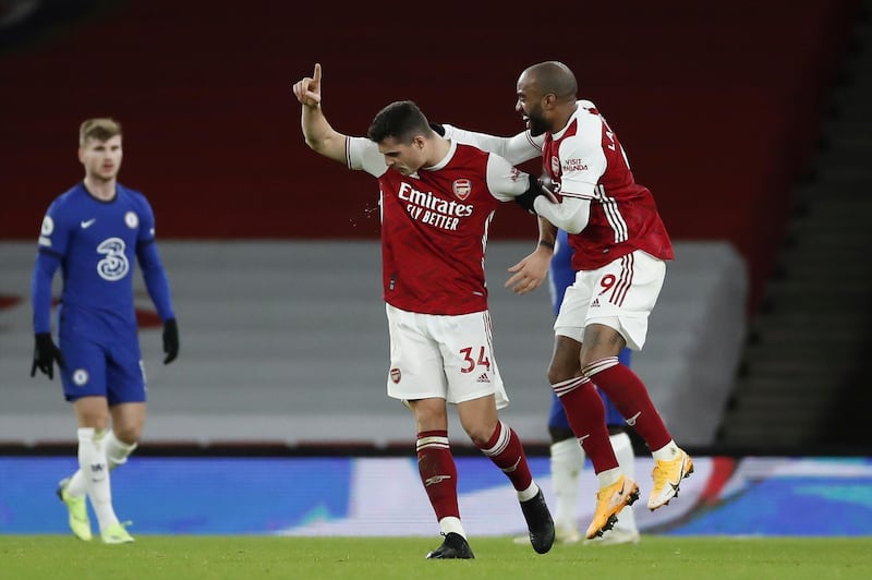 Arsenal's Granit Xhaka celebrates with Alexandre Lacazette after scoring his team's second goal. EPA
