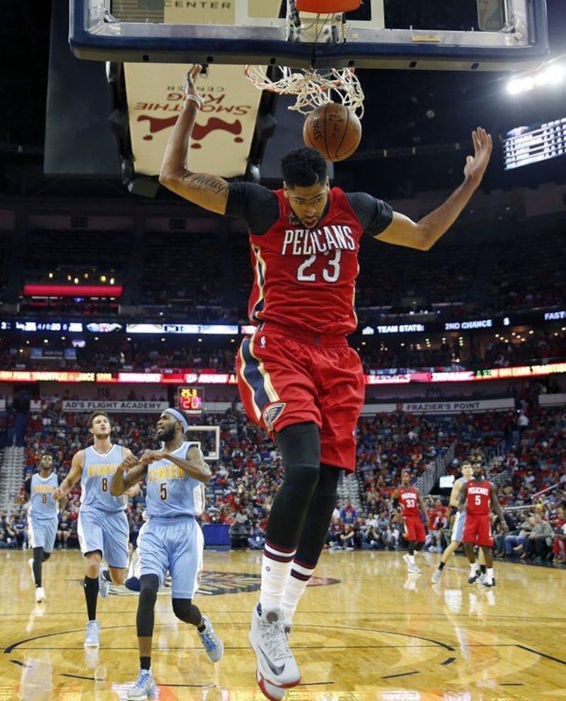 Pelicans forward Anthony Davis dunks against the Nuggets on Wednesday night. Gerald Herbert / AP Photo / October 26, 2016