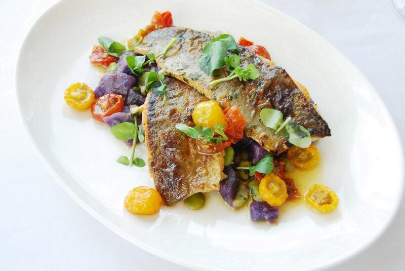 A handout photo of River 'Avon' rainbow trout served with broad beans, Purple Majesty Albert Bartlett crushed potatoes from the new summer menu at Rivington Grill (Courtesy: Rivington Grill)
