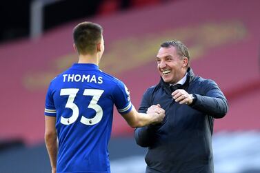 Leicester City's Luke Thomas (left) and manager Brendan Rodgers react after the Premier League match at Old Trafford, Manchester. Picture date: Tuesday May 11, 2021. PA Photo. See PA story SOCCER Man Utd. Photo credit should read: Michael Regan/PA Wire. RESTRICTIONS: EDITORIAL USE ONLY No use with unauthorised audio, video, data, fixture lists, club/league logos or "live" services. Online in-match use limited to 120 images, no video emulation. No use in betting, games or single club/league/player publications.