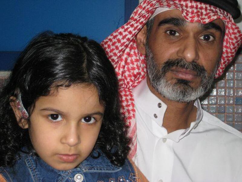 Mansour Al Timani, with his daughter, Nuha, five, and his wife were forcibly divorced after the wife's brothers complained of 'tribal incompatibility'.