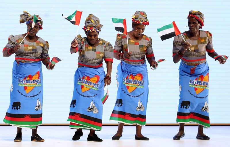 Abu Dhabi, United Arab Emirates - January 15th, 2018: Dancers from Malawi at the Sheikh Zayed Future Energy Prize awards ceremony as part of Abu Dhabi Sustainability Week. Monday, January 15th, 2018 at Abu Dhabi National Exhibition Centre (ADNEC), Abu Dhabi. Chris Whiteoak / The National