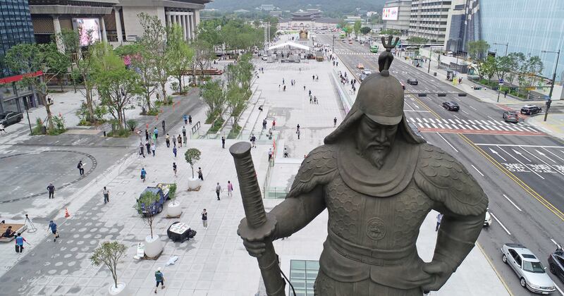 People visit Gwanghwamun Square in central Seoul, South Korea, after it opened to the public following nearly two years of renovation. EPA