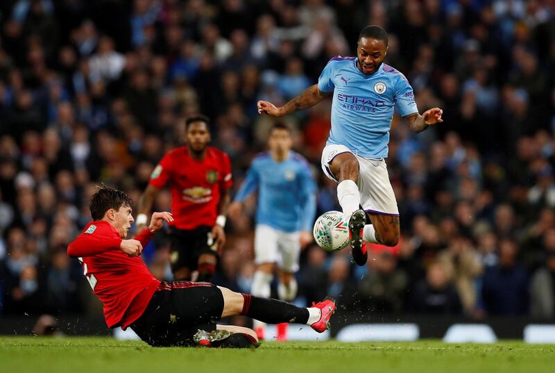 Manchester City's Raheem Sterling takes on Manchester United's Victor Lindelof. Reuters