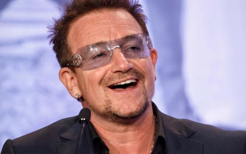 FILE - In this Friday, May 18, 2012 file photo, Bono, the Irish rock star and activist, speaks at the Symposium on Global Agriculture and Food Security following an appearance by President Barack Obama at the Ronald Reagan Building in Washington. It appeared Bono and arachnids didn't mix when his "Spider-Man" musical had a rough Broadway run, but that didn't keep a biologist from naming an actual spider species after the U2 singer. Jason Bond of Auburn University has identified 33 new species of trapdoor spider, including three of them in the California desert at Joshua Tree National Park. The park's namesake is featured in the title and cover of U2's 1987 album, "The Joshua Tree." (AP Photo/J. Scott Applewhite, File)
