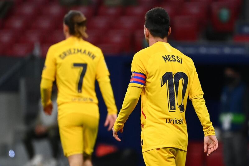 Lionel Messi and Antoine Griezmann during the match between Atletico Madrid and Barcelona. AFP