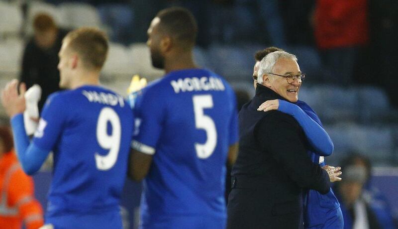 Leicester City manager Claudio Ranieri celebrates with Christian Fuchs after the game. Reuters / Darren Staples