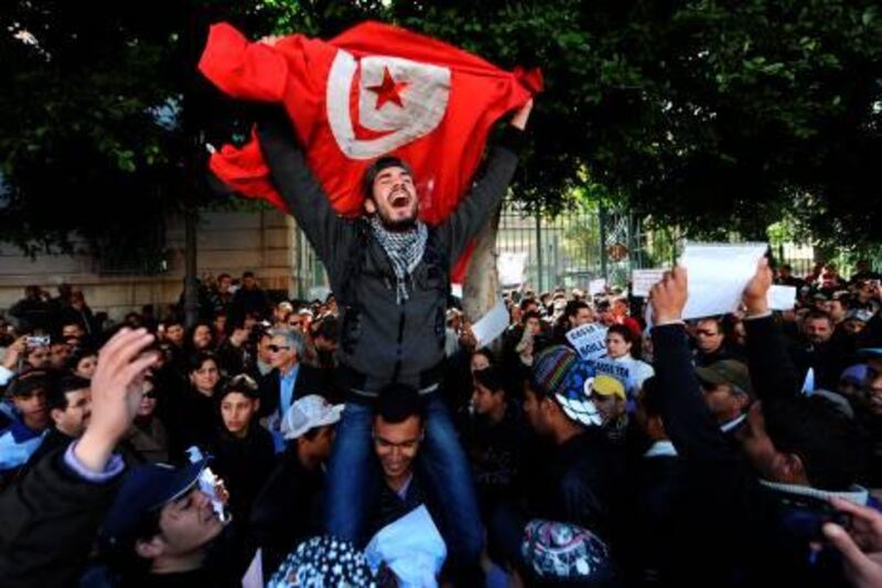 Tunisians protest outside the gates to the French embassy in Tunis for remarks made by French ambassador Boris Boillon on his arrival and calling for his departure on February 19, 2011. While calling for a "new page" in relations between France and Tunisia, Boillon, 41, refused to take questions from some journalists at a press conference yesterday and dismissed others as "stupid." Extracts from the encounter were broadcast on Tunisian television and sparked a Facebook page calling for Boillon to go.   AFP PHOTO / FETHI BELAID