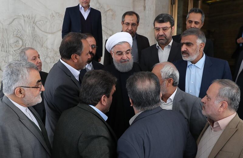 epa06413341 A handout photo made available by the presidential official website shows, Iranian President Hassan Rouhani (C) greeting heads of parliament commissions after their meeting in Tehran, Iran, 01 January 2018, (issued 02 January 2018). Media reported that at a crisis meeting in parliament on 01 January 2018, President Rouhani said it would be a mistake to classify the protests as foreign conspiracy. 'The problems of people are not only economic, but they also demand more freedom.' He thus indirectly criticized the hardliners in the clergy, who block his reforms. According to Rouhani, the protests should not be viewed as a threat but as an opportunity.  EPA/PRESIDENTIAL OFFICIAL WEBSITE / HANDOUT  HANDOUT EDITORIAL USE ONLY/NO SALES