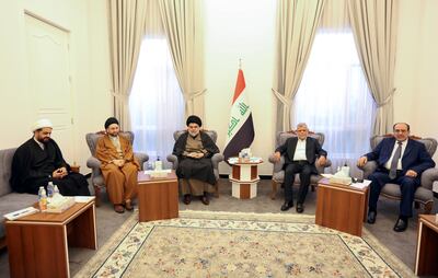 Moqtada al-Sadr with Qais al-Khazali, Hadi al-Amiri, Ammar al-Hakim and Nouri al-Maliki in Baghdad, December 2021.  Reuters
