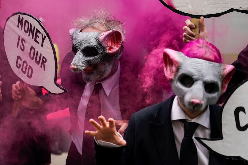 Demonstrators outside the UK Department for Business, Energy and Industrial Strategy in London. AP Photo